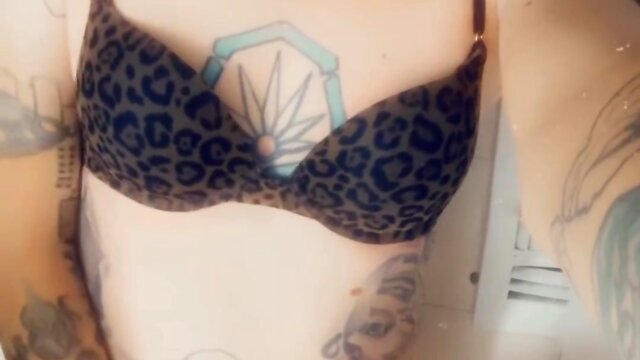 Cheetah print bikini-wearing woman opens legs for fucking