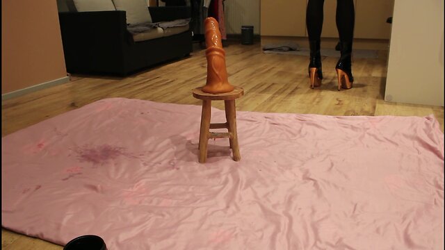 Riding a large horse in high heels