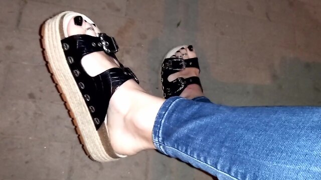 Crossdressing foot fetishist in public