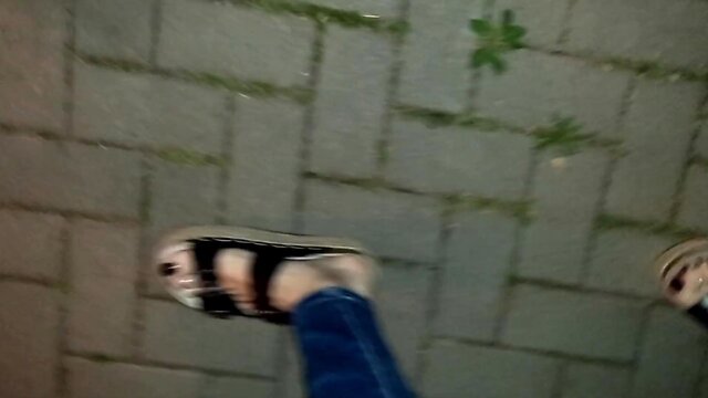 Crossdressing foot fetishist in public