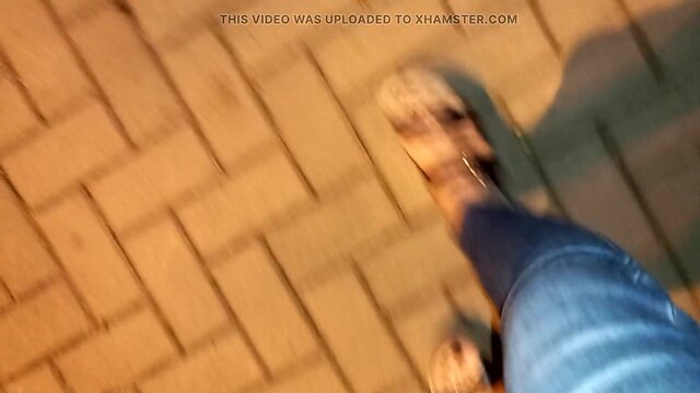 Crossdressing foot fetishist in public