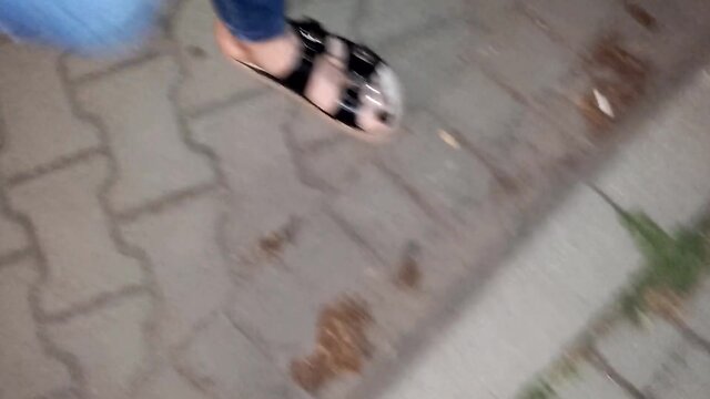 Crossdressing foot fetishist in public