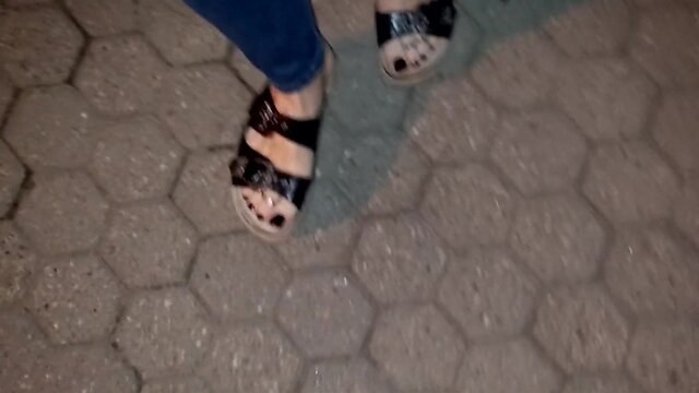 Crossdressing foot fetishist in public