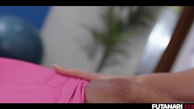 Futa brunette erupts with orgasmic release in gym