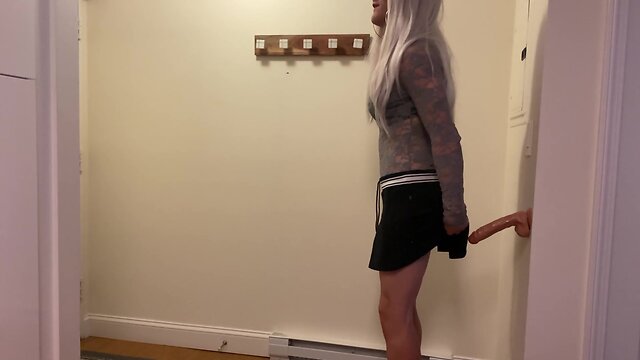 Crossdresser fucked with dildo in kitchen