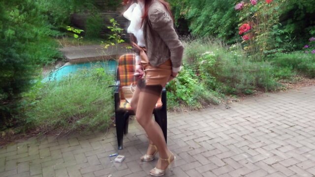 Leather miniskirt, nylon stockings & sheer blouse cumshot