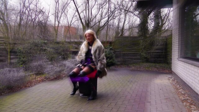 Fur-clad anal slut in boots