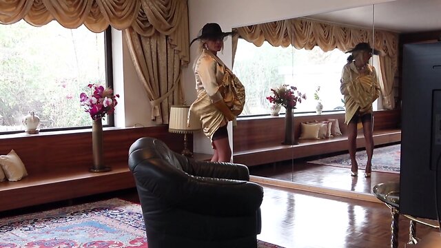 Chantal dazzles in pleated satin gown