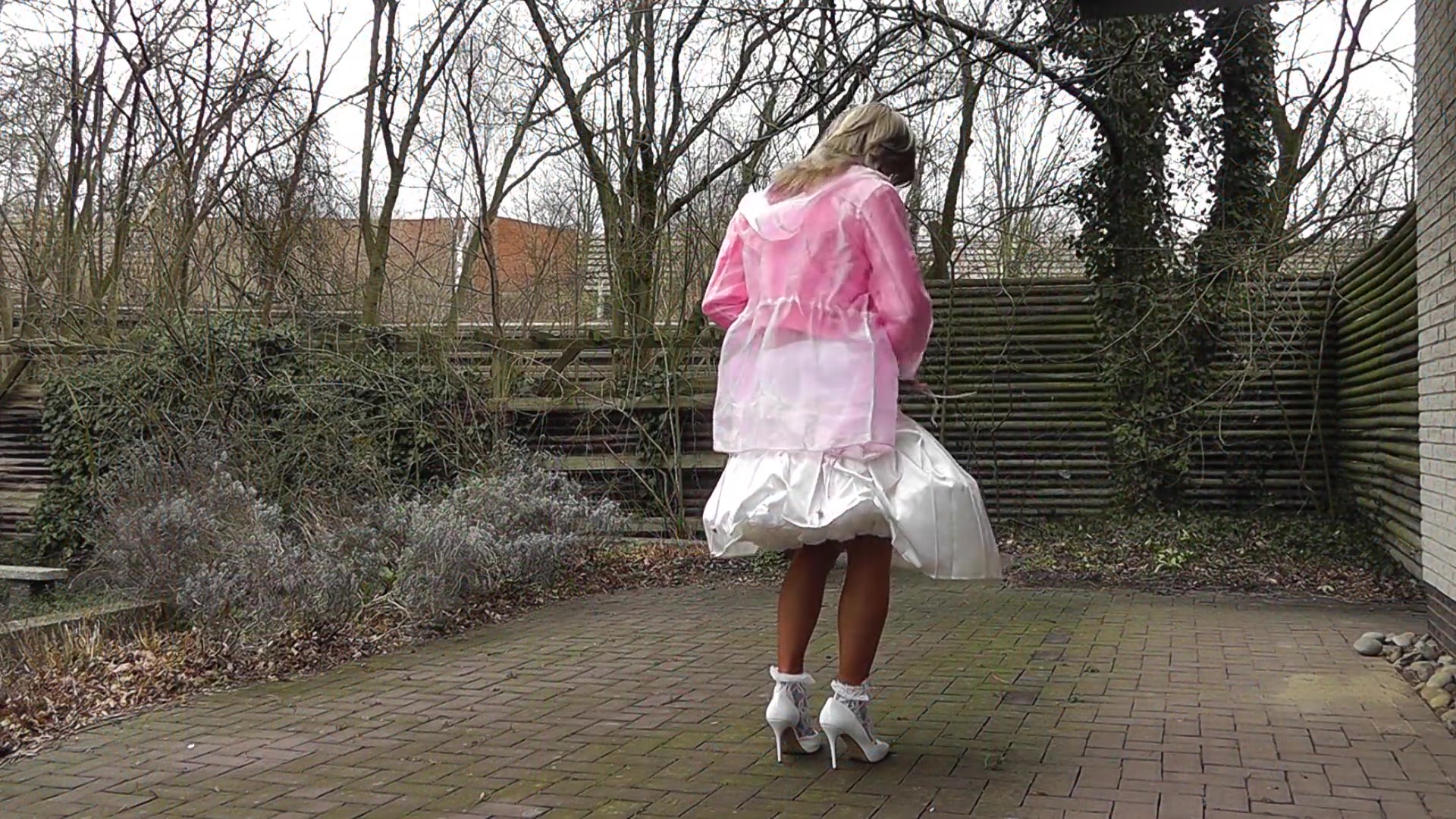 Sissy in satin petticoat and nylon stockings cumshot
