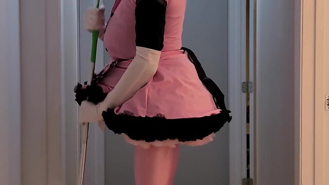 Rubberdoll displays and cleans outfit