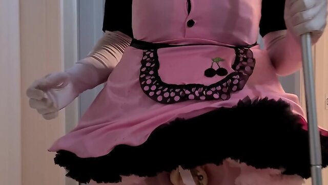 Rubberdoll displays and cleans outfit