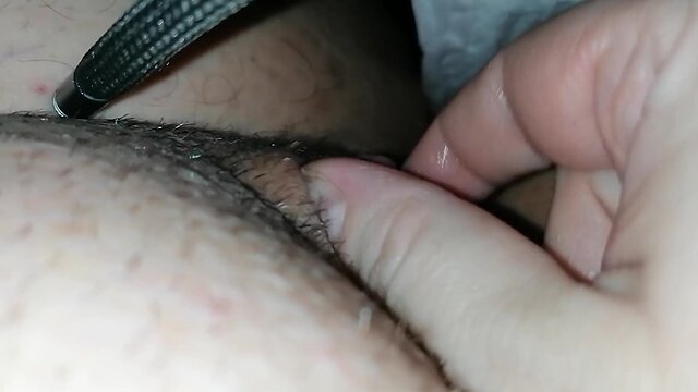 Trans person stimulates their clitoris to intense orgasm