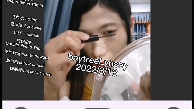 Ms. lynsey applies makeup on webcam