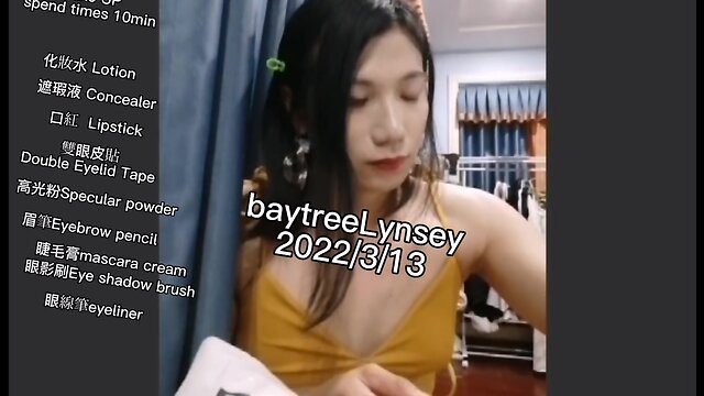 Ms. lynsey applies makeup on webcam