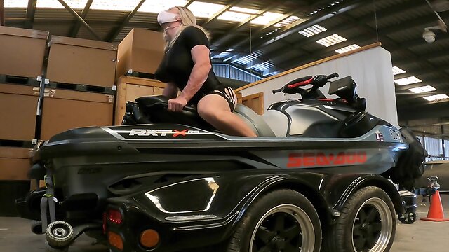 Flamboyant person engaging in coitus on fathers jetski