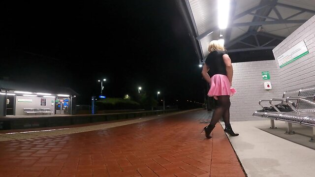 Publicly exposed sissy muscle slut at train station