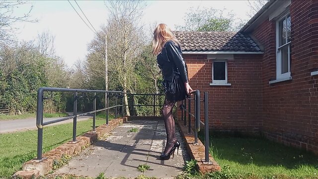 Gina in pvc performing at village hall