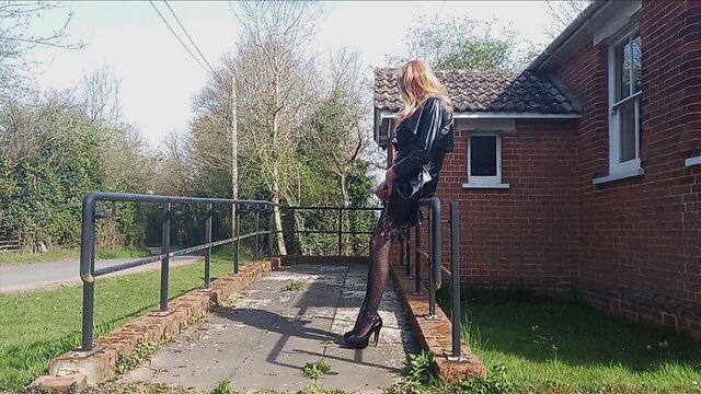 Gina in pvc performing at village hall