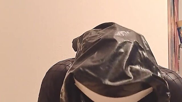 Dronedoll cd-betina sounds her sissy-clitty in black rubber and latex