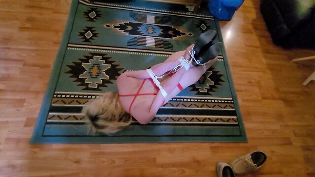 Crystal hogtie on the floor