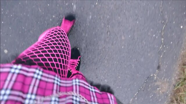 Monique in bimbo doll boots outdoors