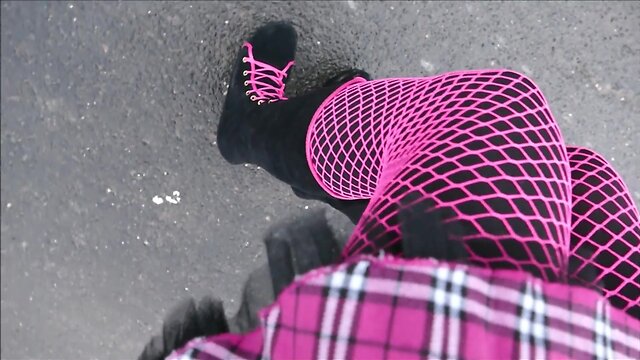 Monique in bimbo doll boots outdoors