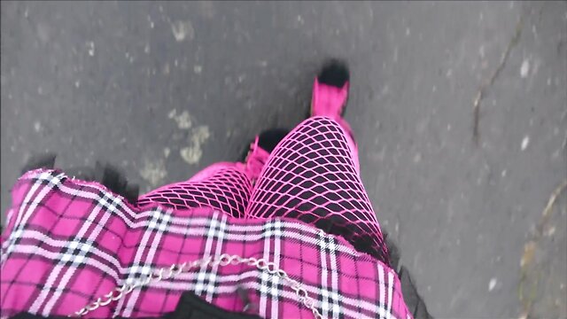 Monique in bimbo doll boots outdoors