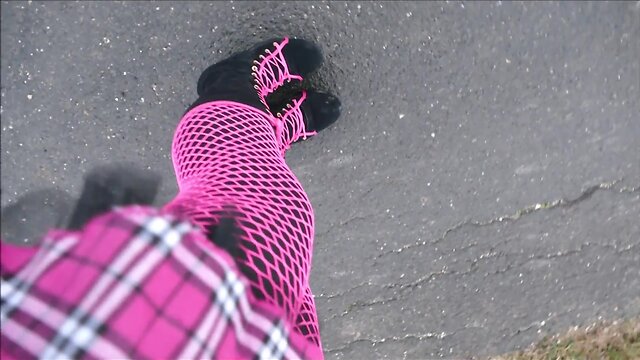 Monique in bimbo doll boots outdoors