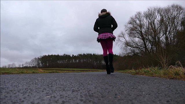 Monique in bimbo doll boots outdoors