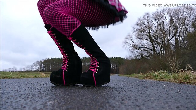 Monique in bimbo doll boots outdoors