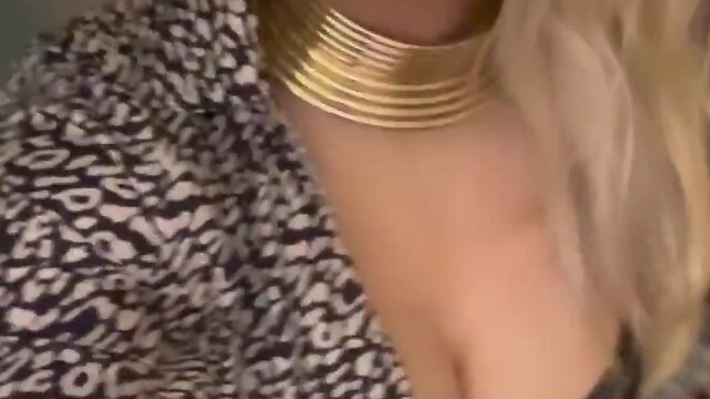 Blonde woman in 6 inch heels sucking dildo