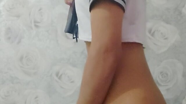 Shani removes clothing