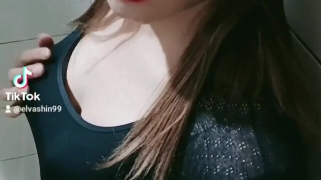 Asian crossdresser performing solo