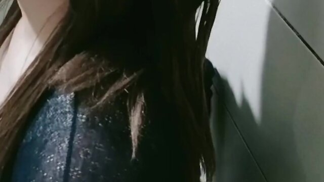 Asian crossdresser performing solo