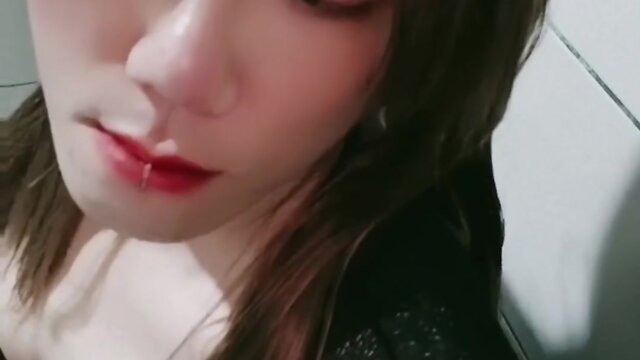 Asian crossdresser performing solo