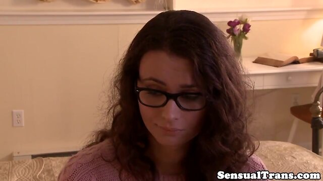 Tgirl enjoys intimate moment with partner.