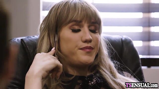 Assisting hot busty boss shemale in black lingerie