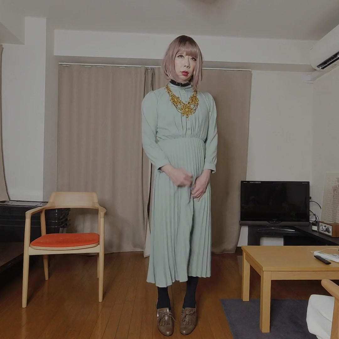 Japanese crossdresser cumshots when excited by genitals touched through long dress