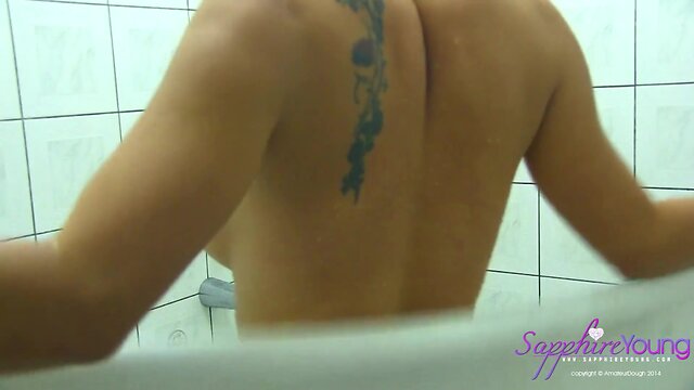 Sapphire young plays with soap in the shower: wet trans experience