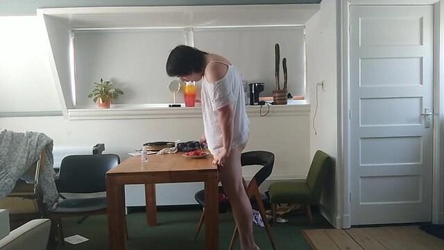 Eating strawberries with a creamy topping