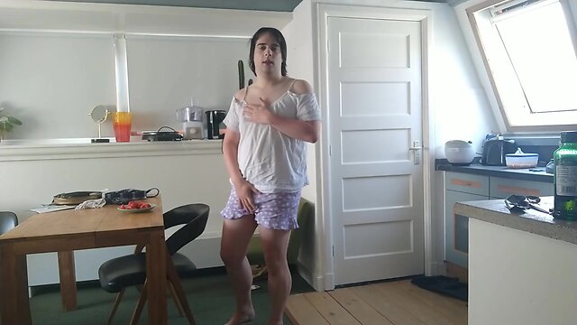 Eating strawberries with a creamy topping