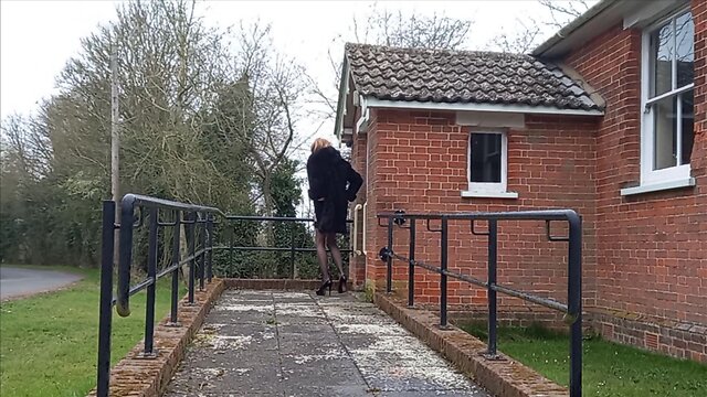 Squirting crossdresser in pvc masturbates outdoors