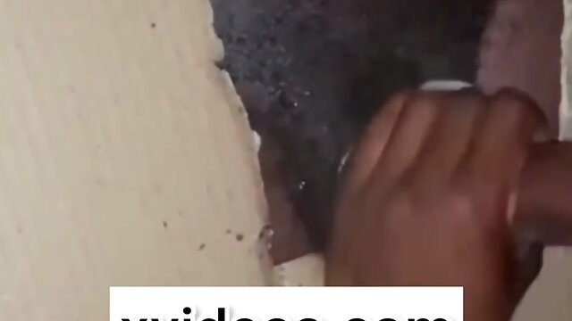 Transgender women enjoying glory hole blowjobs