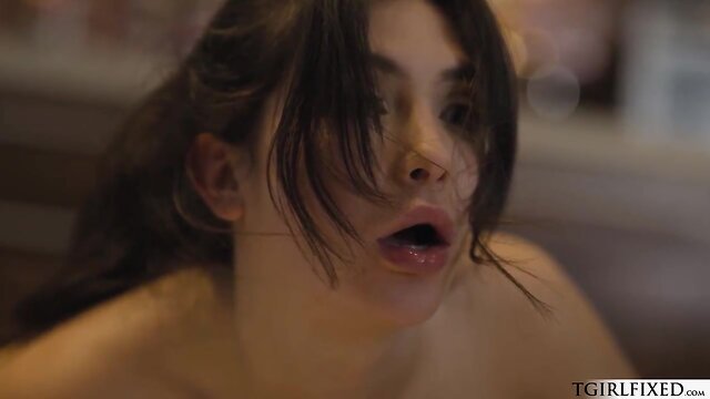 Big-breasted transgender and teen have steamy encounter at the counter