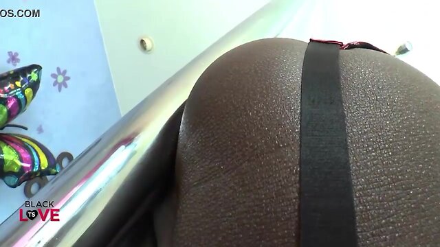 Mesmerizing pole dancing performance by a talented black transgender individual