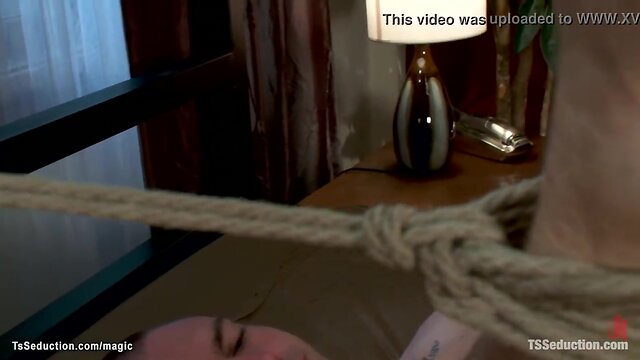 Interracial ts gets bent over and fucked on bed by man