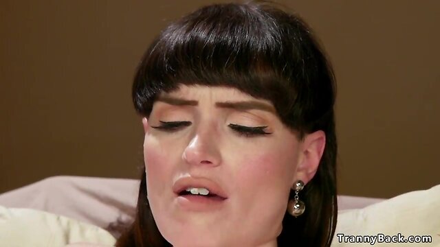 Dominant tranny rides her male slaves face