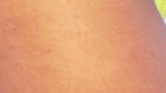 Attempting to insert a dildo in the butt