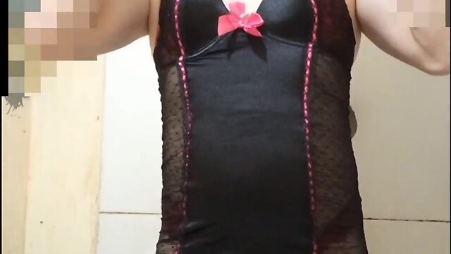 Carol dressed in a tight-fitting camisole