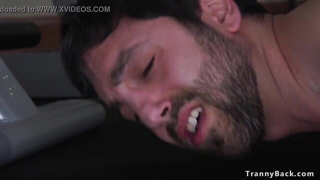 Transgender mistress with tattoos dominates guy in anal sex